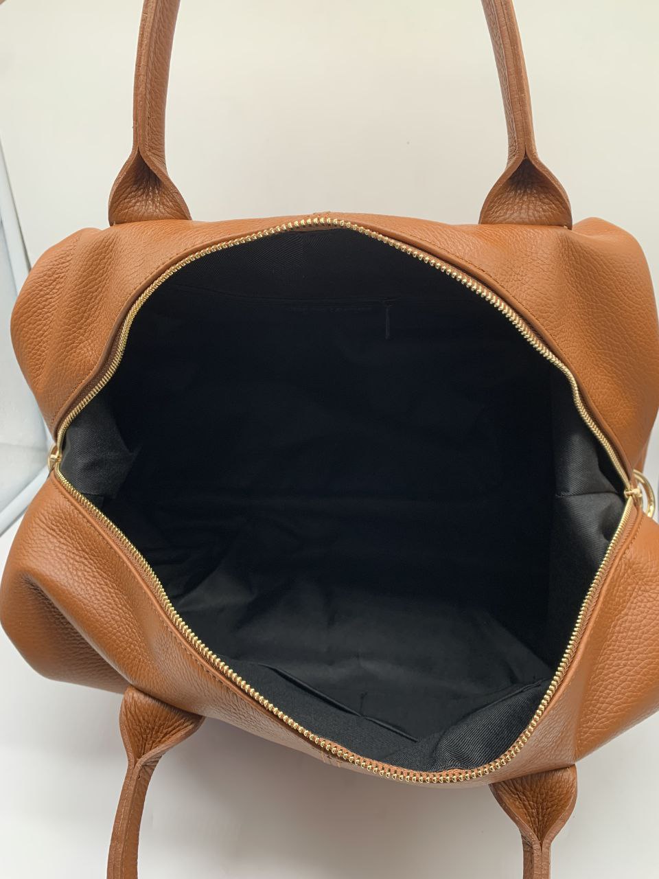 Sac de voyage en cuir avec bandoulière