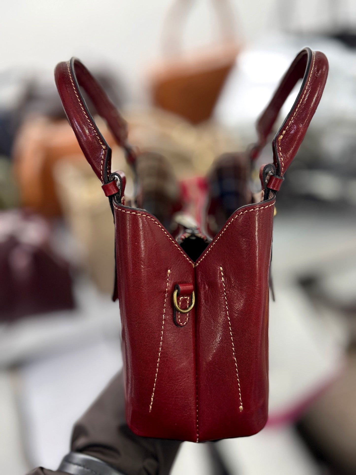 Structured Leather Top Handle Bag with Zip Closure and Shoulder Strap